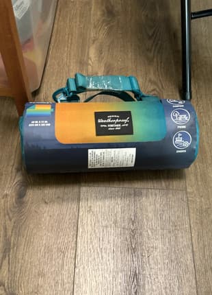 Target weatherproof vintage throw in orange and navy, new with tags